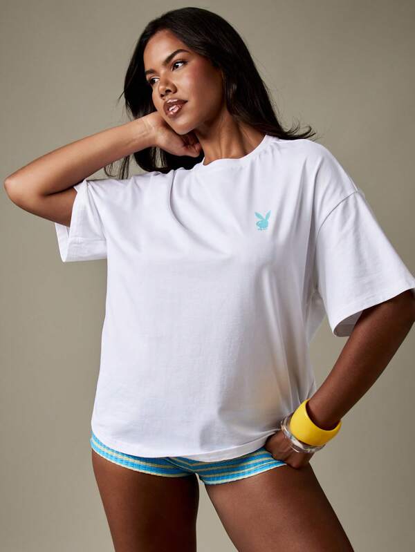 Missguided Missguided X Playboy Oversized Paradise Beach Scene T-Shirt With Retro Graphic Print