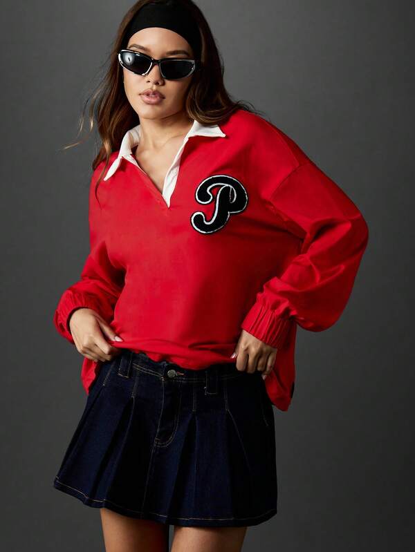 missguided Missguided x Playboy Oversized Rugby Top With Collared Neckline And Bunny Print