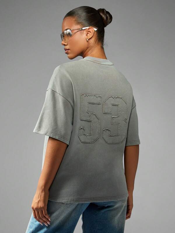 Missguided Missguided X Playboy Oversized T-Shirt With Distressed Logo And Number