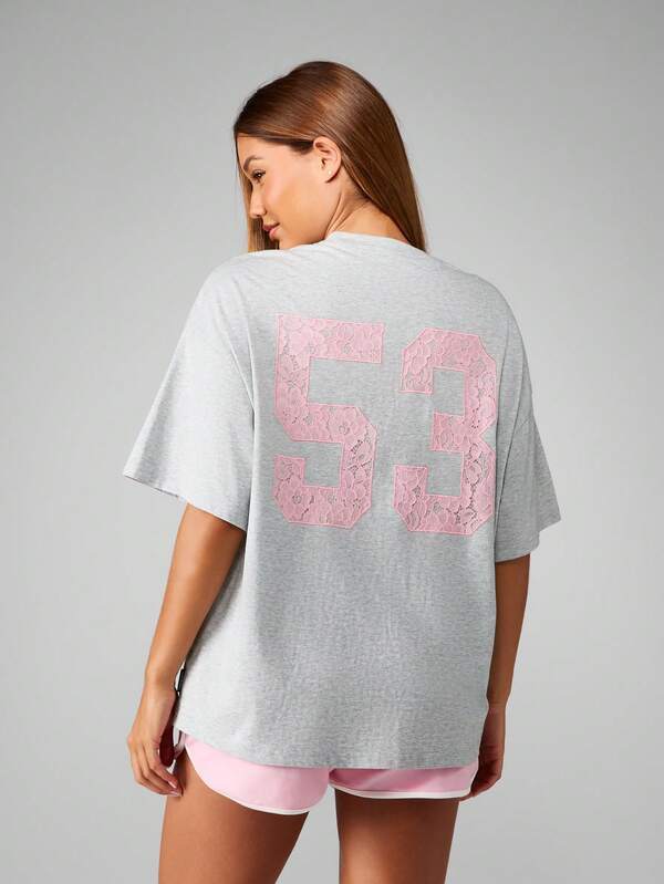 Missguided Missguided X Playboy Oversized T-Shirt With Pink Lace Number Design