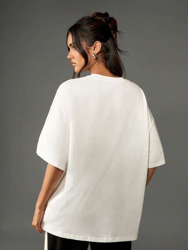 Missguided Missguided X Playboy Oversized T-Shirt With Star Logo Graphic Print