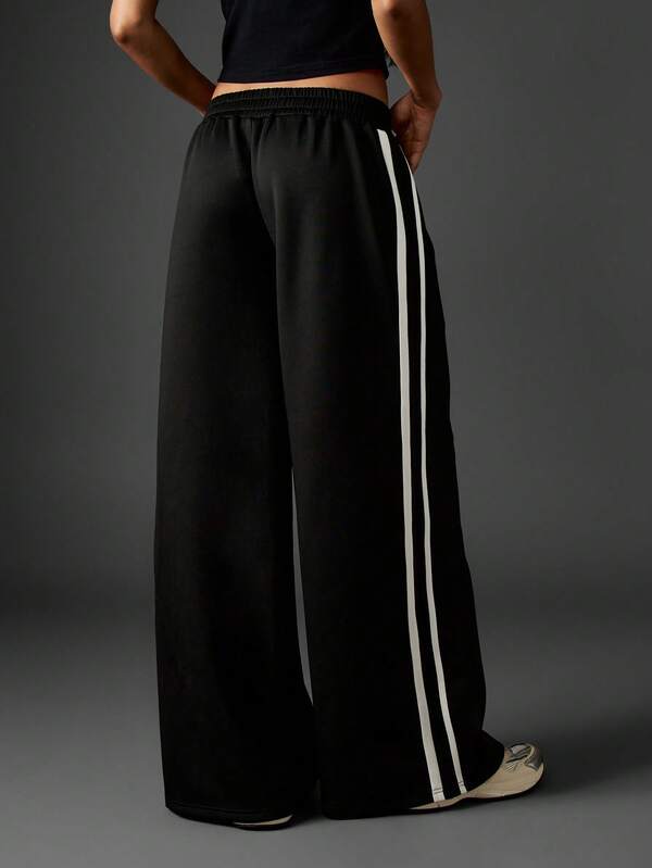 Missguided Missguided X Playboy Oversized Wide Leg Joggers With Side Stripes