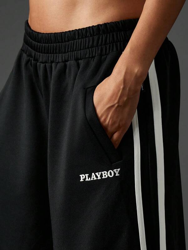 Missguided Missguided X Playboy Oversized Wide Leg Joggers With Side Stripes