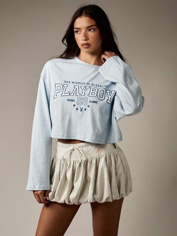 missguided Missguided x Playboy Retro Graphic Crop Top With Long Sleeves And College Text