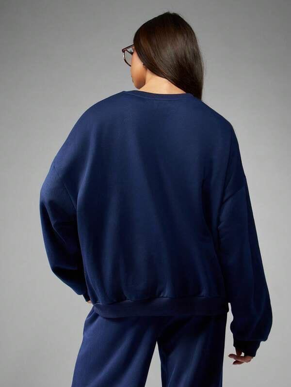 Missguided Missguided X Playboy Retro Varsity Sweatshirt With Graphic Print And Crew Neck