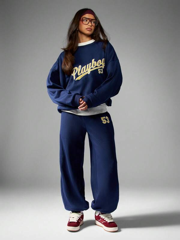 Missguided Missguided X Playboy Retro Varsity Sweatshirt With Graphic Print And Crew Neck