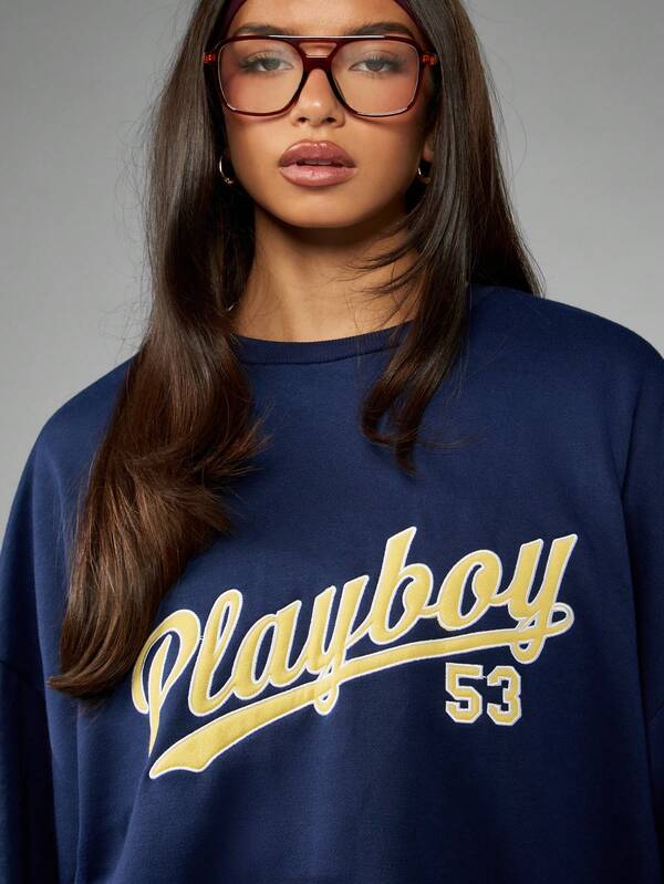Missguided Missguided X Playboy Retro Varsity Sweatshirt With Graphic Print And Crew Neck