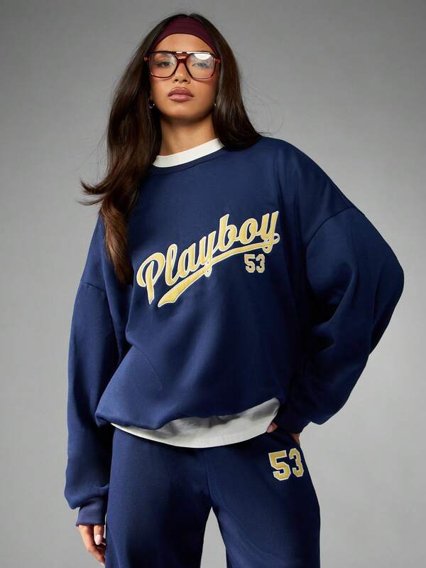 missguided Missguided x Playboy Retro Varsity Sweatshirt With Graphic Print And Crew Neck