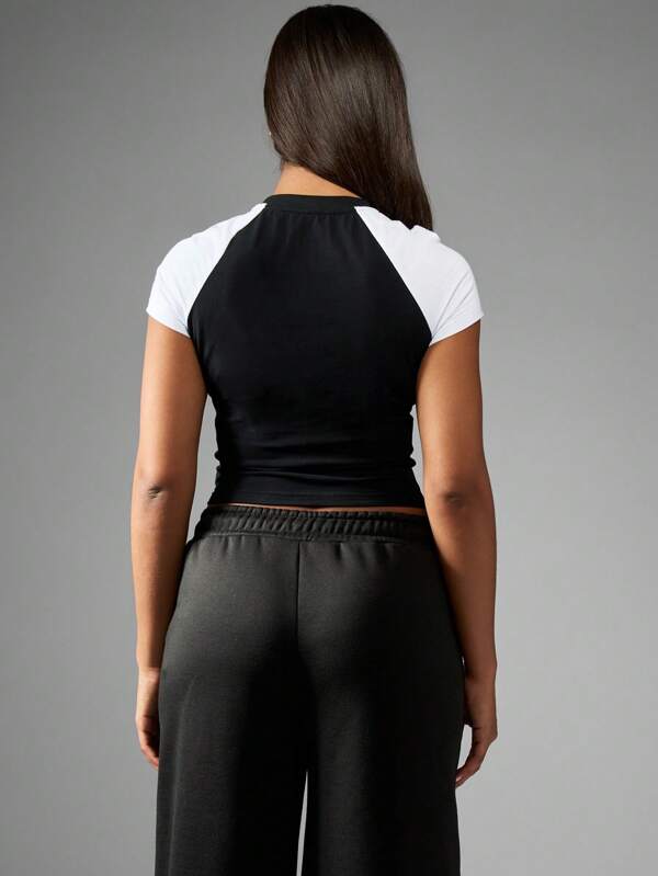 Missguided Missguided X Playboy Short Sleeve Fitted Raglan Crop Top With Bunny Logo