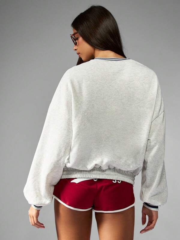 Missguided Missguided X Playboy Varsity Graphic Crew Neck Sweatshirt With Elastic Hem