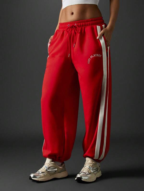 Missguided Missguided X Playboy Varsity Logo Sweatpants With Side Stripes And Elastic Cuffs