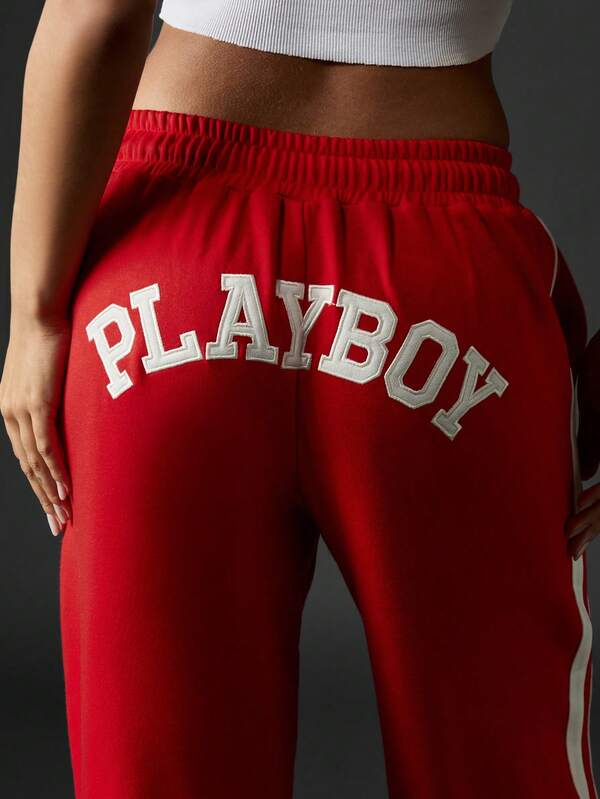 Missguided Missguided X Playboy Varsity Logo Sweatpants With Side Stripes And Elastic Cuffs