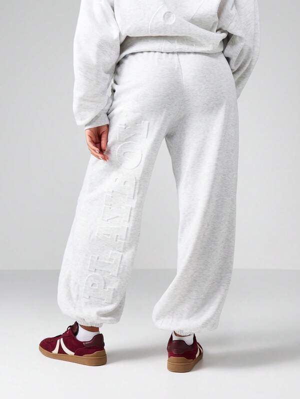 Missguided Missguided X Playboy Wide Leg Cuffed Joggers With Embossed Logo Pattern