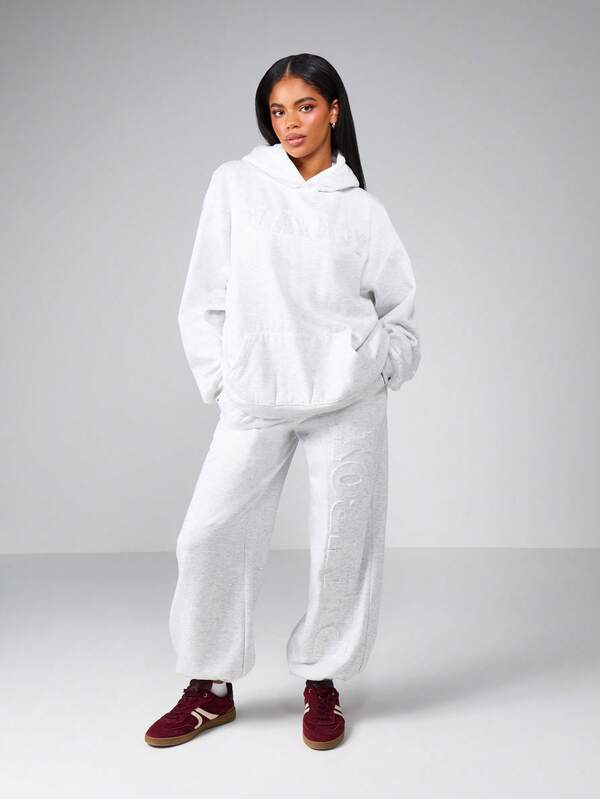 Missguided Missguided X Playboy Wide Leg Cuffed Joggers With Embossed Logo Pattern