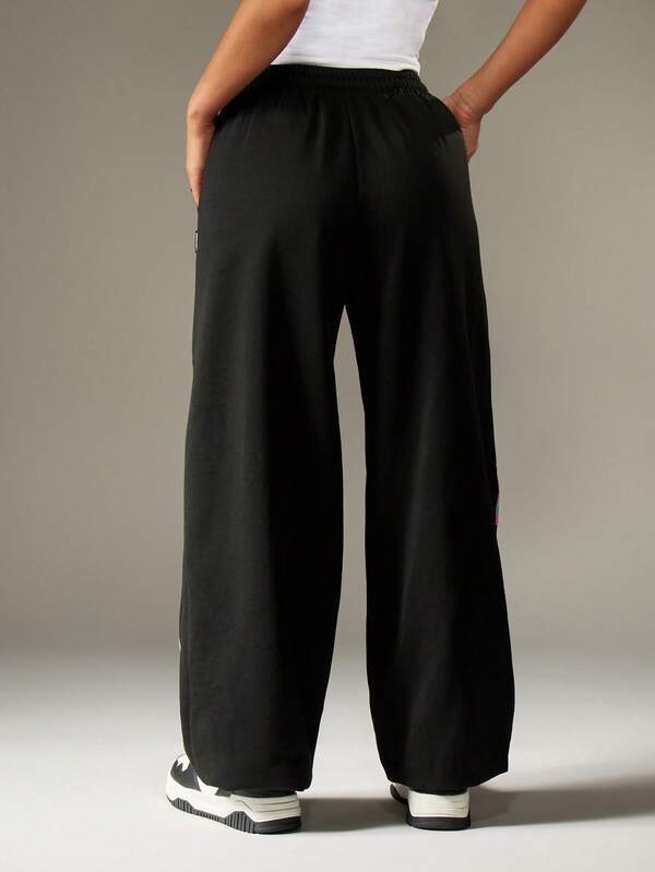 Missguided Missguided X Playboy Wide Leg Joggers With Colorful Graphics