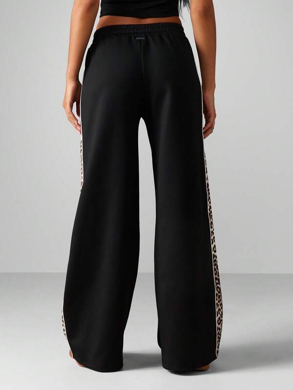 Missguided Missguided X Playboy Wide Leg Joggers With Leopard Print Stripe