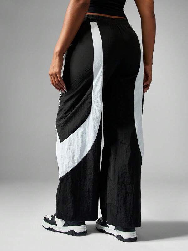 Missguided Missguided X Playboy Wide Leg Track Pants With Contrast Panel Design