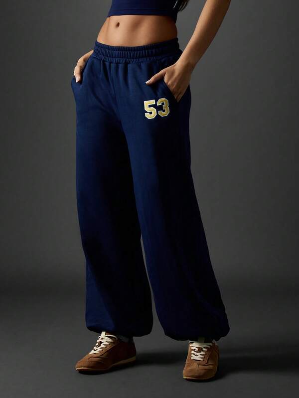 Missguided Missguided X Playboy Wide Leg Varsity Jogger Pants With Number Graphics