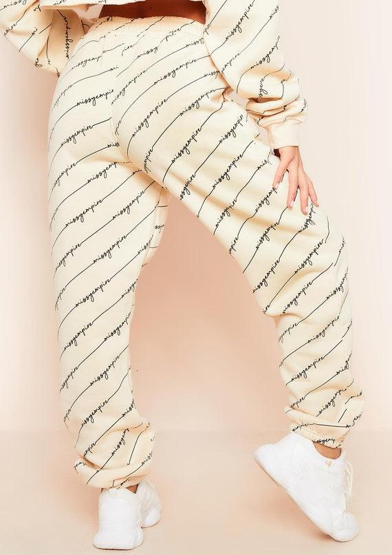 Missyempire Eliora Cream Missy Empire Repetitive Slogan Joggers
