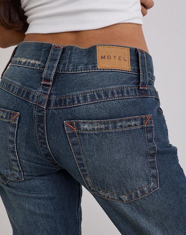 Motel Rocks Low Rise Twisted Seam Jeans In Mid Blue Tint