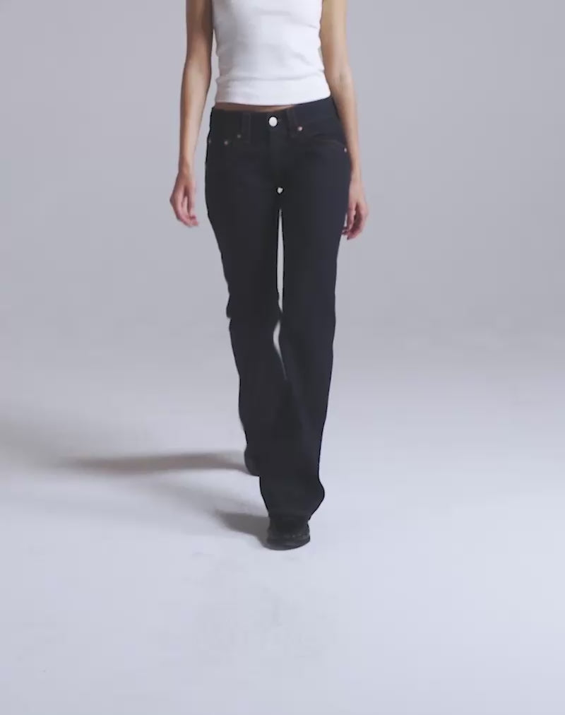 Motel Rocks Low Rise Twisted Seam Jeans In Indigo