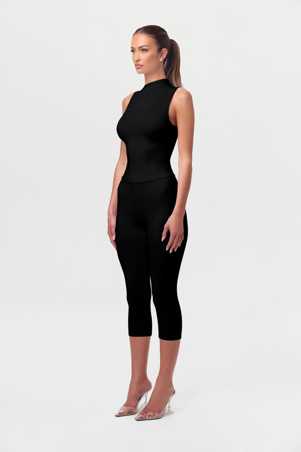 Naked Wardrobe Smooth Sculpt Capri Legging