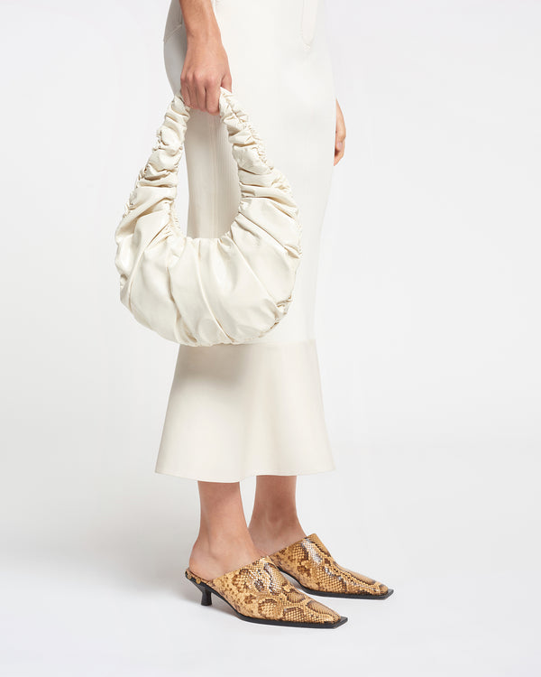 Nanushka ANJA BAGUETTE - Ruched Patent Alt-leather Shoulder Bag - Cream - Nanushka