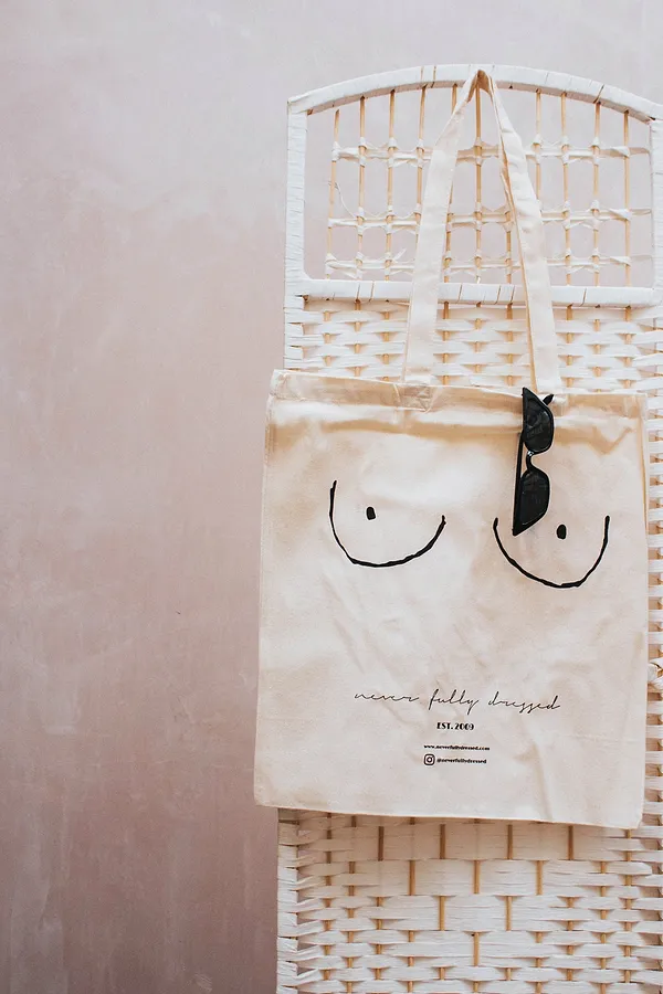 never fully dressed Boob Bag