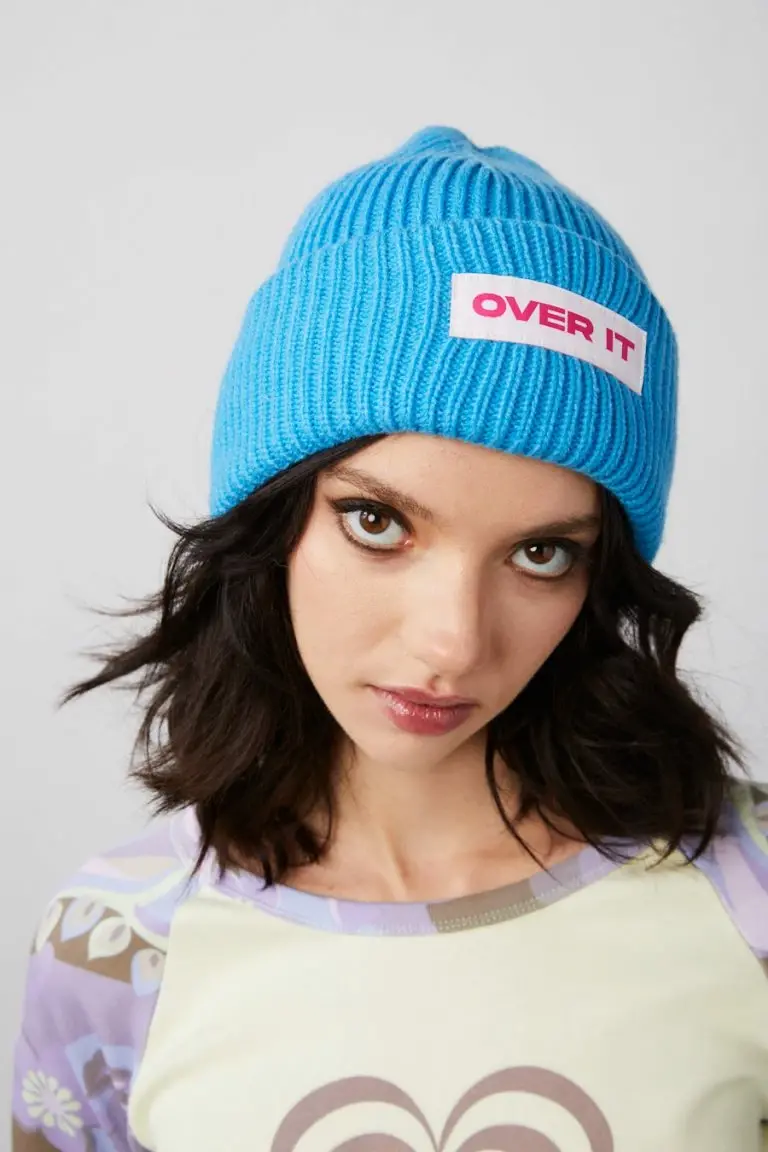 new girl order New Girl Order RIBBED BEANIE WITH OVER IT BADGE DETAIL – BLUE Tops