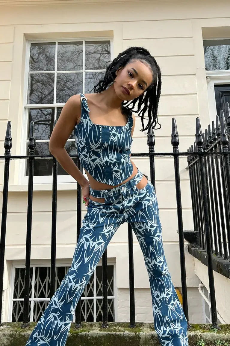 new girl order New Girl Order TATTOO DENIM CUT OUT FLARES