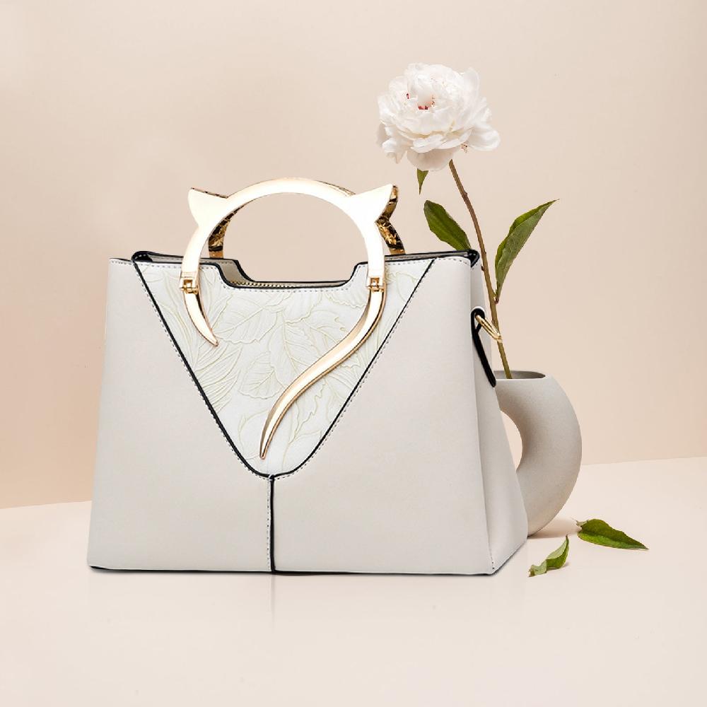 Nicole & Doris Cat Shape Handle Flower Carved Pattern Handbag