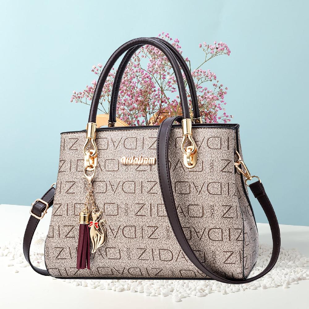 Nicole & Doris Cat & Tassel Decor Glossy Handbag