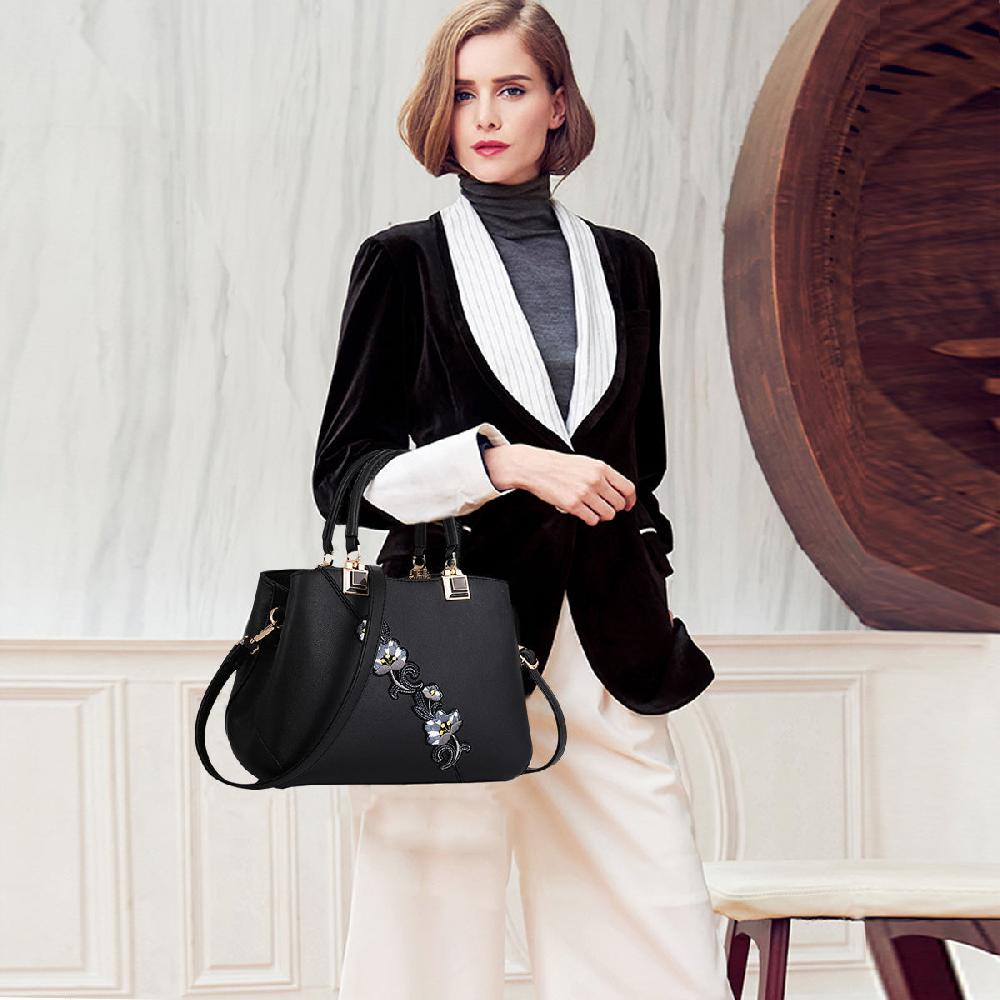 Nicole & Doris Pom Pom Decor Dichromatic Handbag