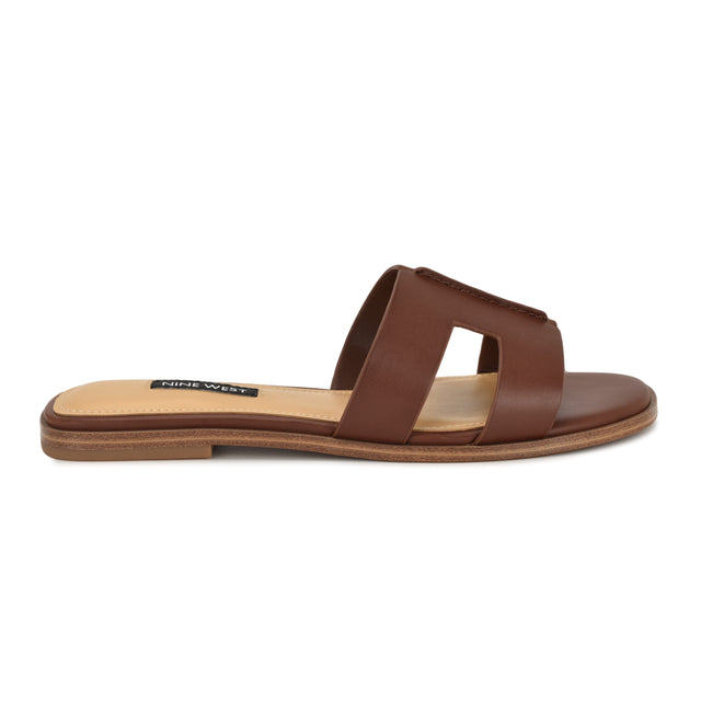 nine west Giny Slip-On Flat Studded Sandals