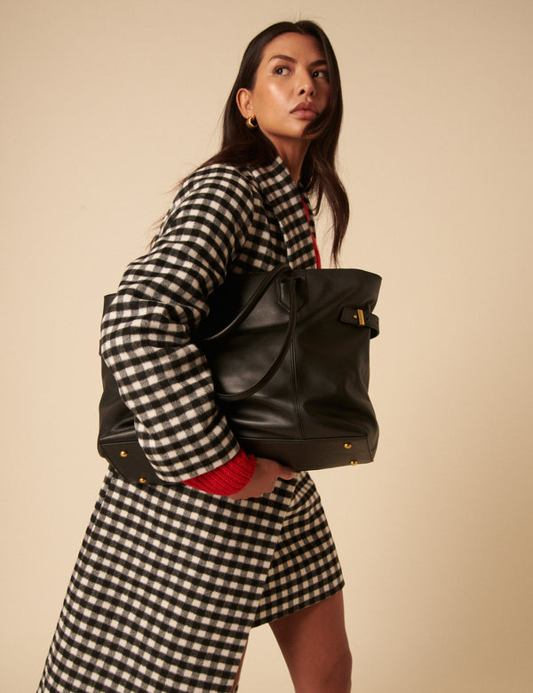 nobody’s child Black Leather Tote Bag