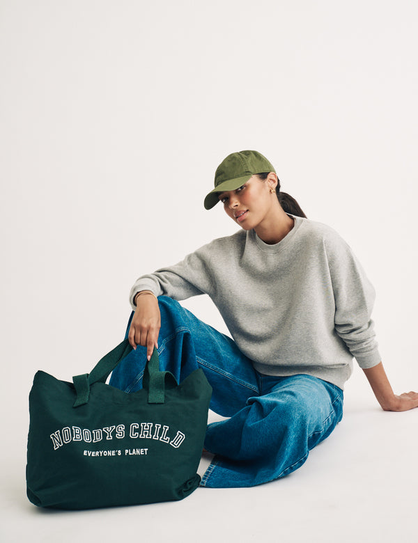 nobody’s child Green Canvas Tote Bag