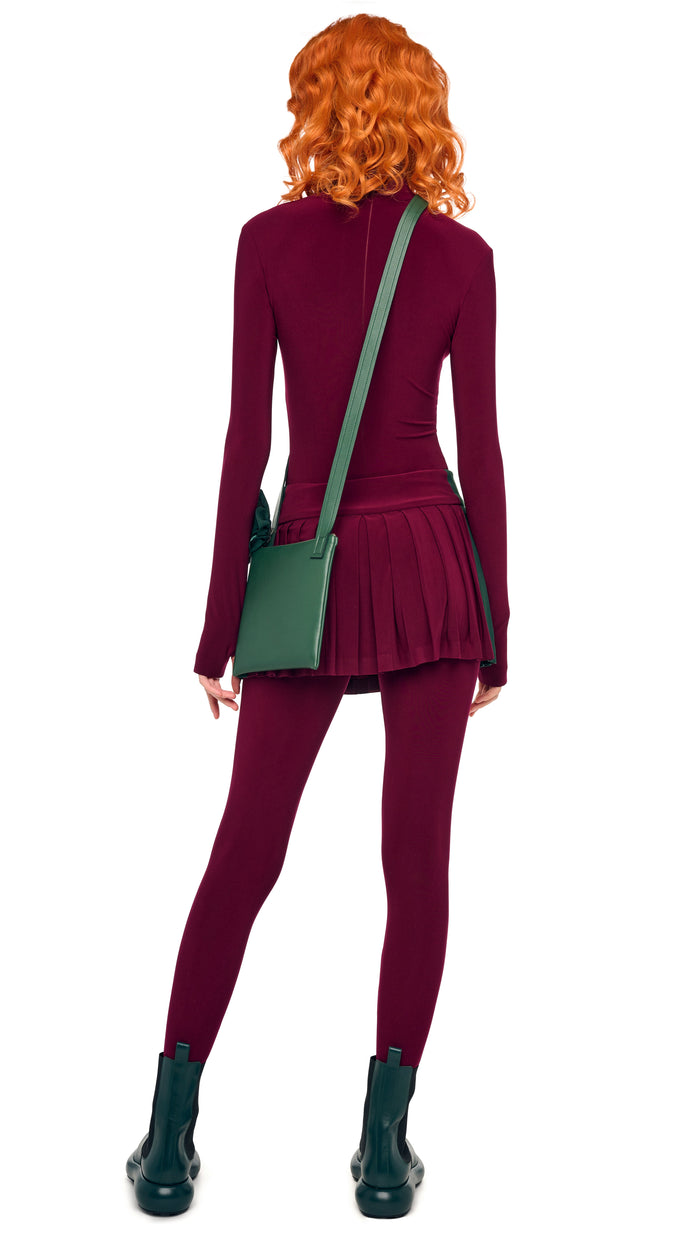 Norma Kamali SIDE STRIPE PLEATED PICKLEBALL SKIRT