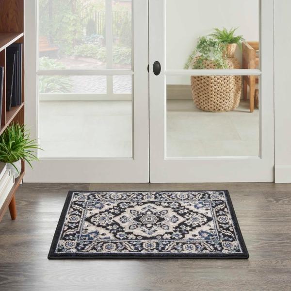 Nourison Passion PSN33 Black Ivory Rug
