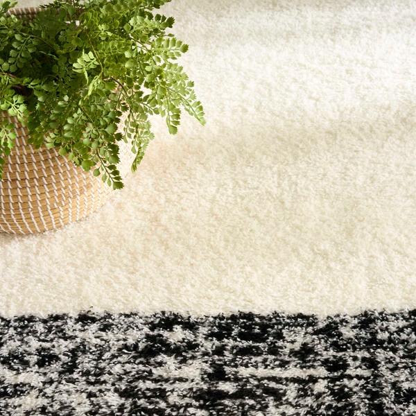 Nourison Pacific Shag Ivory Black Indoor Only Solid Rug PCS02