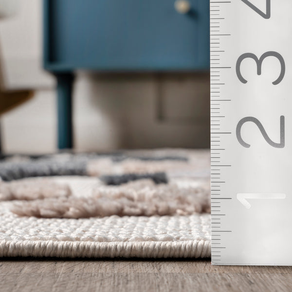 Nuloom Aaran Dinosaur Kids Tasseled Area Rug Beige