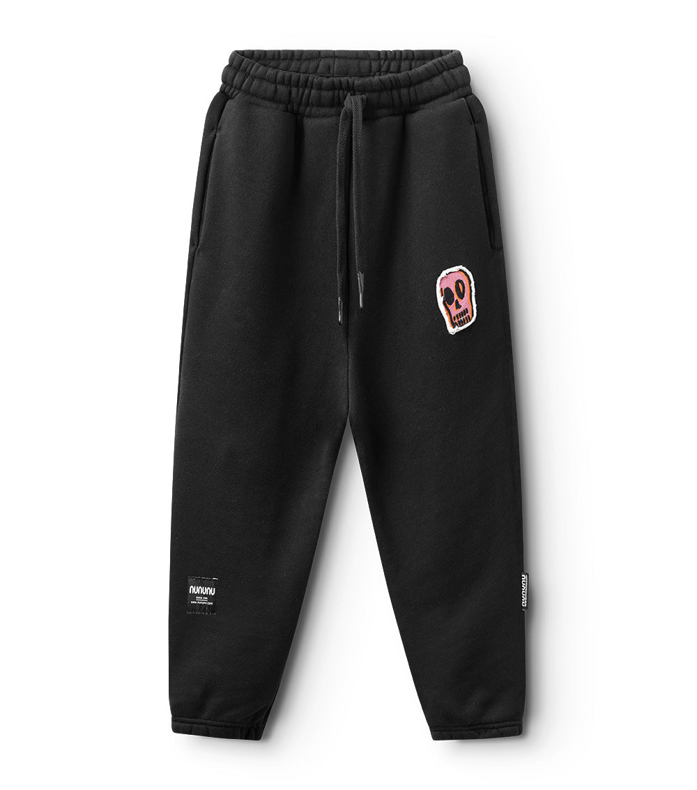 nununu dizzy skull patch sweatpants