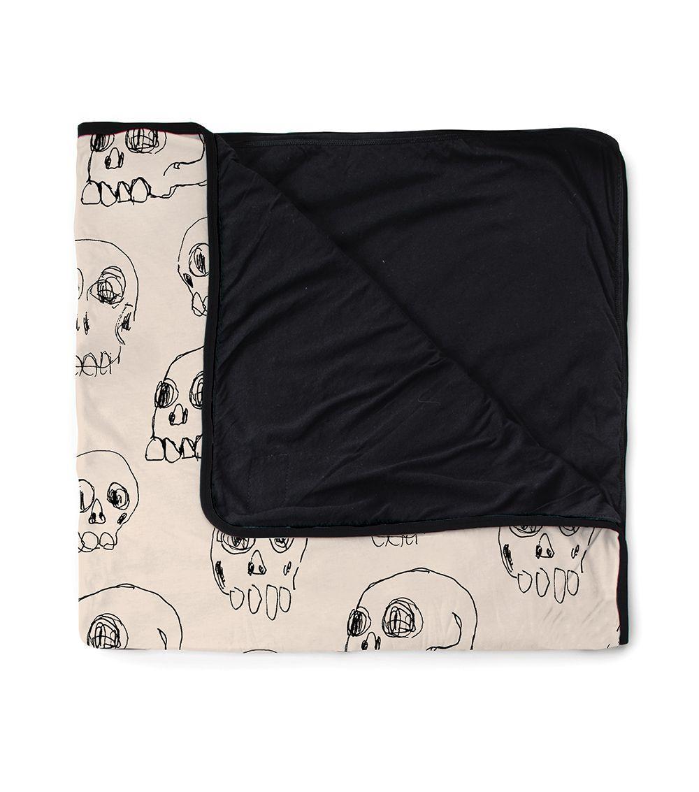 nununu scribbled skulls blanket