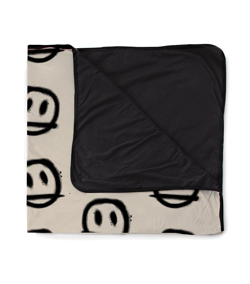 nununu sprayed smiles blanket natural