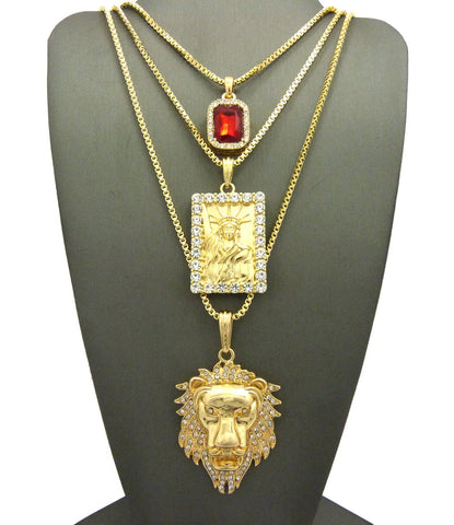 nyfashion101 Ruby Red Gemstone Statue of Liberty & Noble Lion Head Pendant Set w/ Box Chains in Gold-Tone