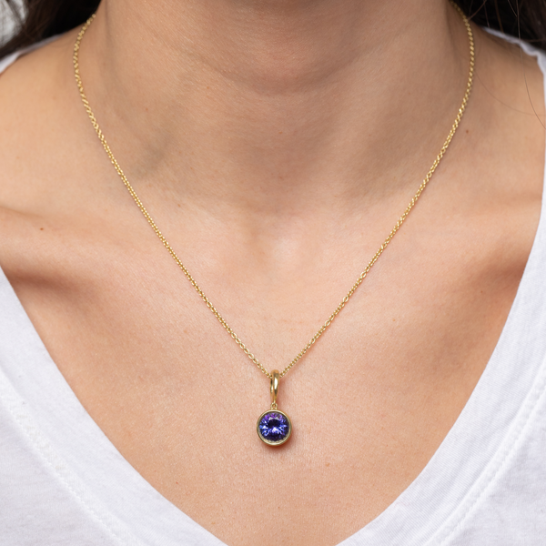 Octavia Elizabeth Hidden Gem Pendant - Round Tanzanite