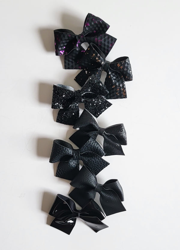 olivia's bow 7 Shades of Black