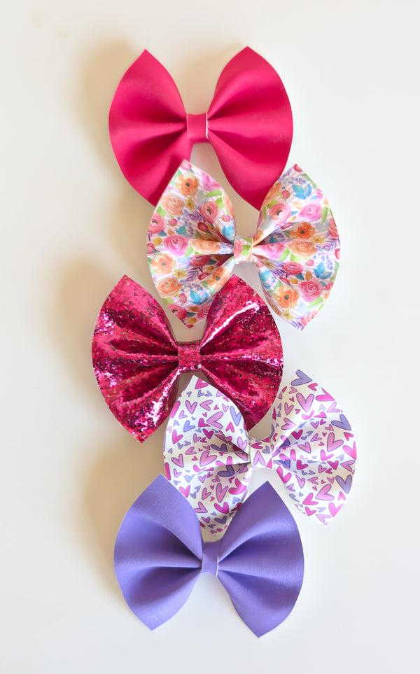 olivia's bow Electric Hearts Collection