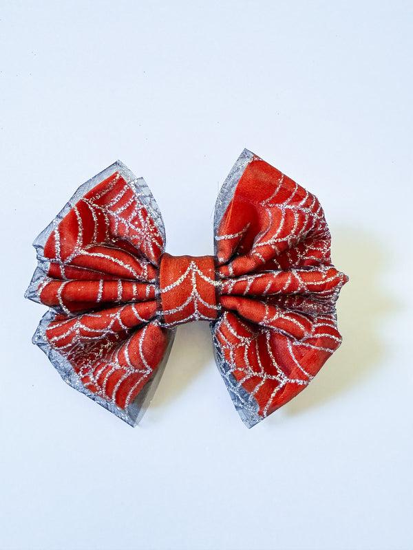 olivia's bow Webbed & Wild Spooky Orange