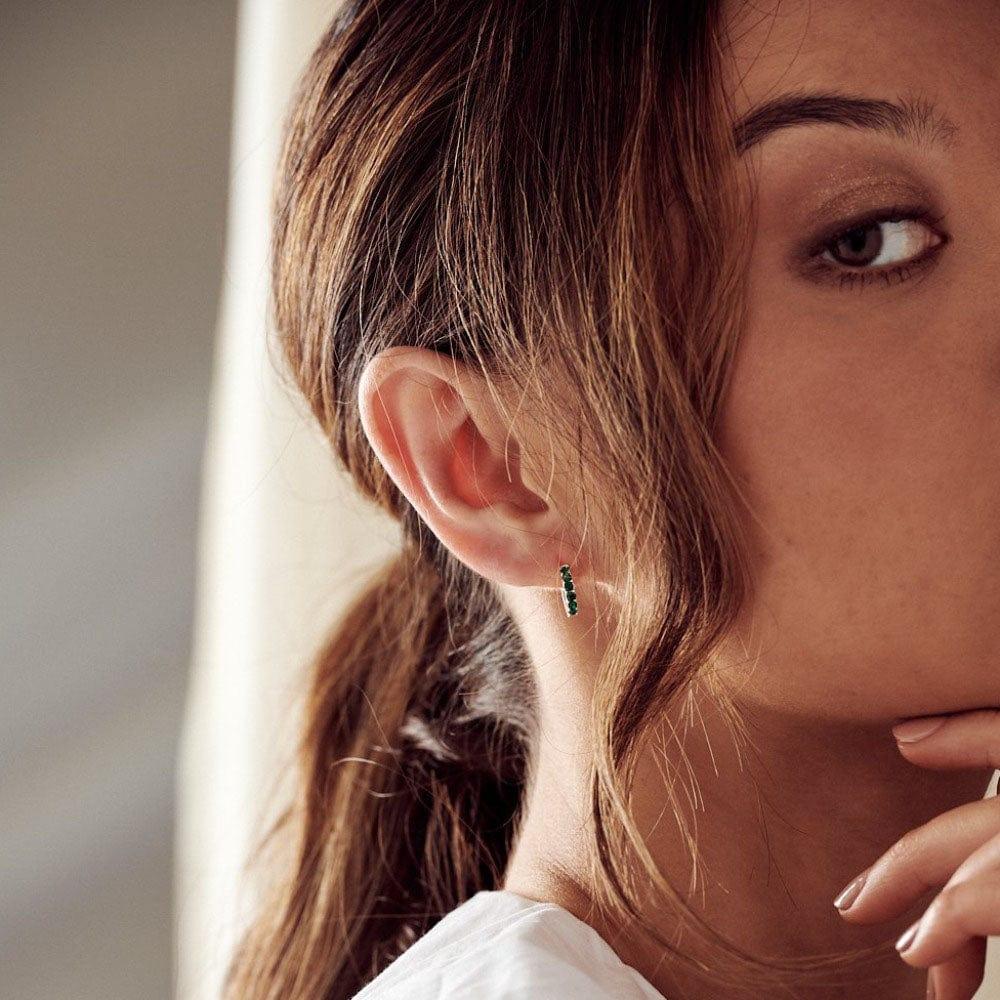 Orelia Emerald Huggie Hoop Earrings Made With Swarovski® Crystals - Silver