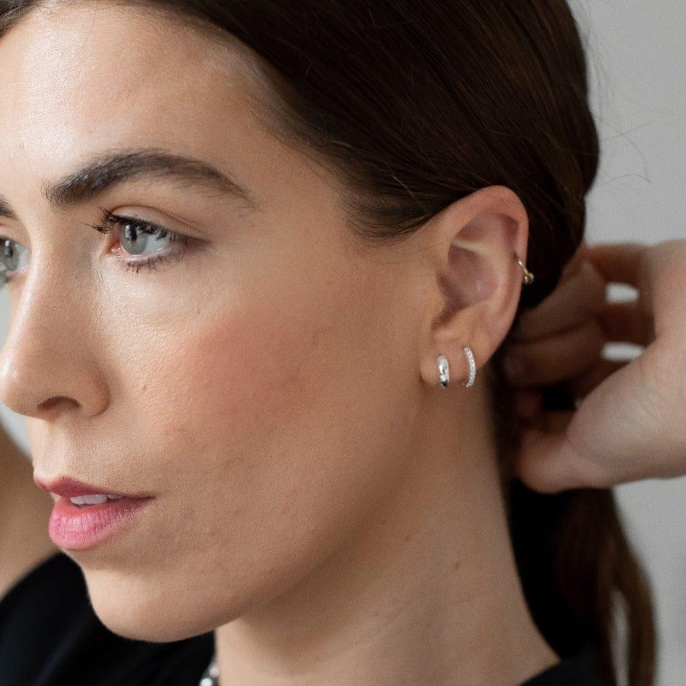 Orelia Mini Domed Clean Huggie Hoop Earrings - Silver